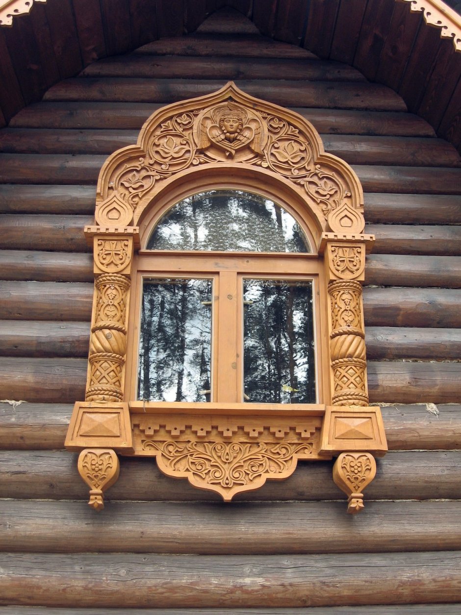 Прорезная резьба наличники на окна веранда