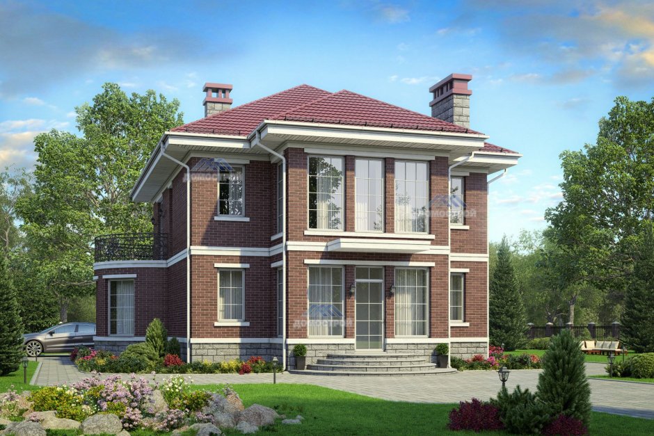 Двухэтажный дом с эркером и балконом