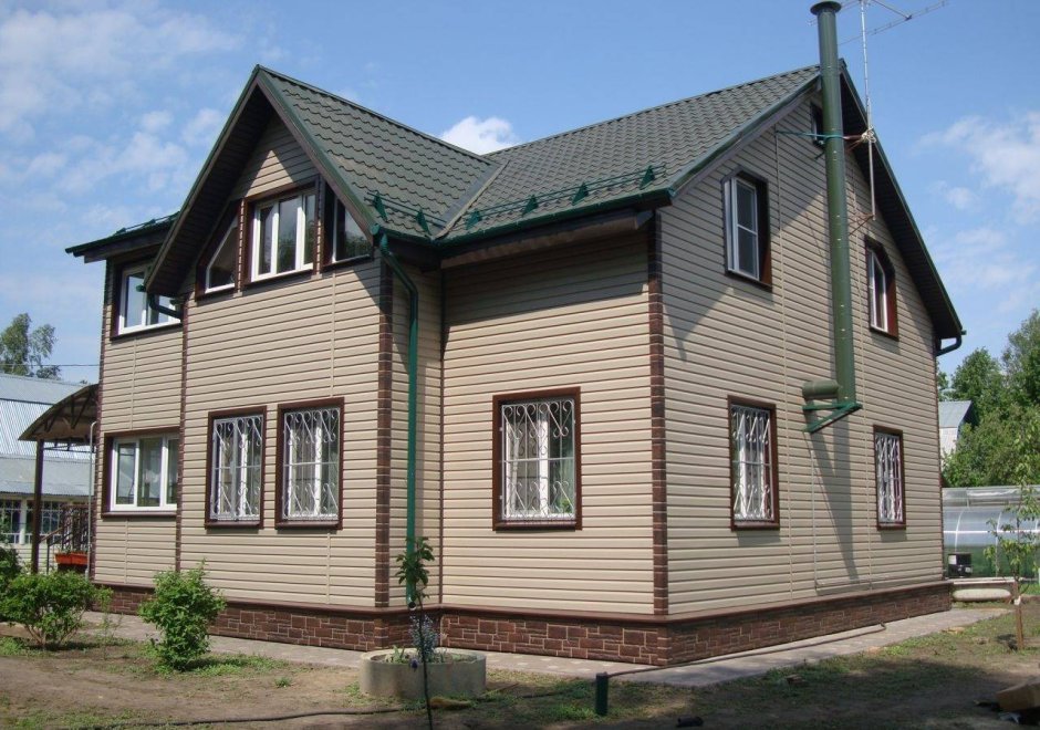 Фасады домов из сайдинга
