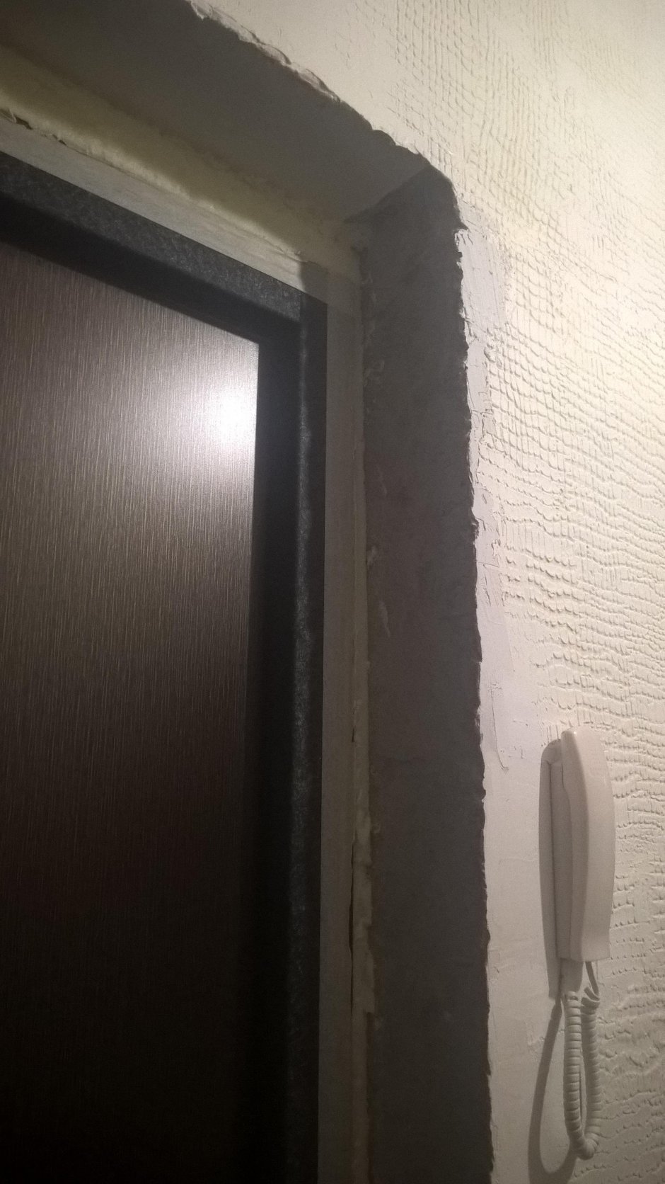 Штукатурка откосов дверного проема входной двери