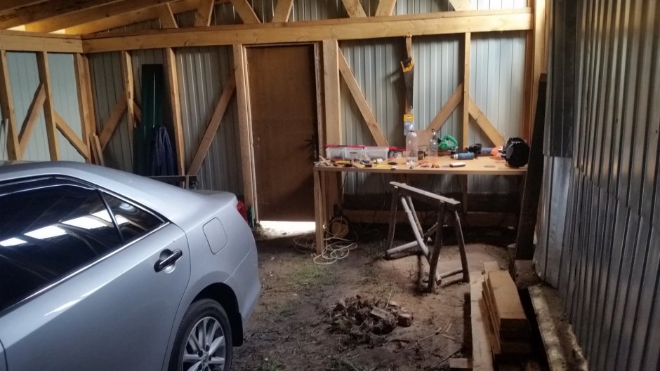 Пристрой гаража к деревянному дому