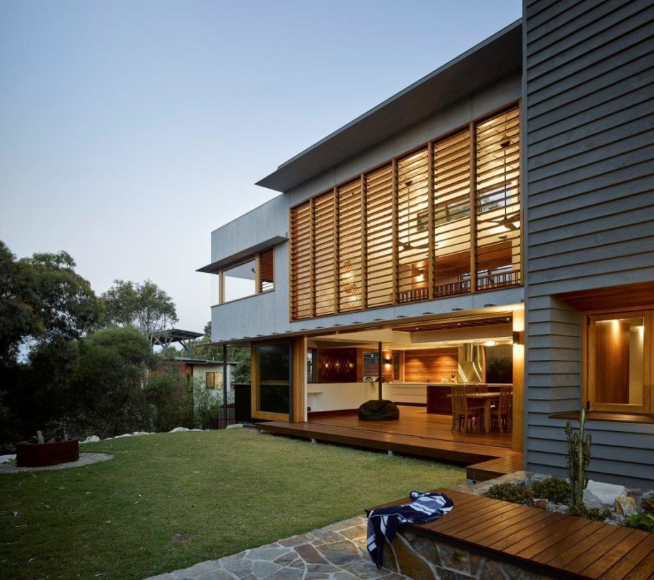 Exterior facade with a Flat Roof of a Blue House