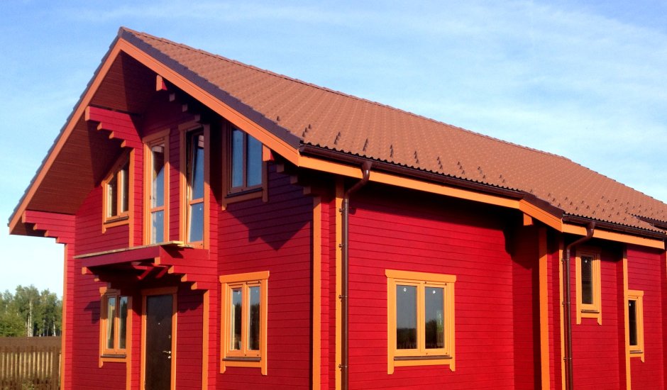 Окраска деревянного дома