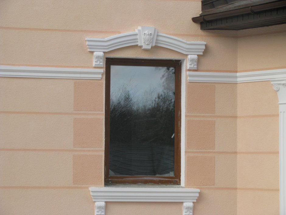 Замковый камень наличник
