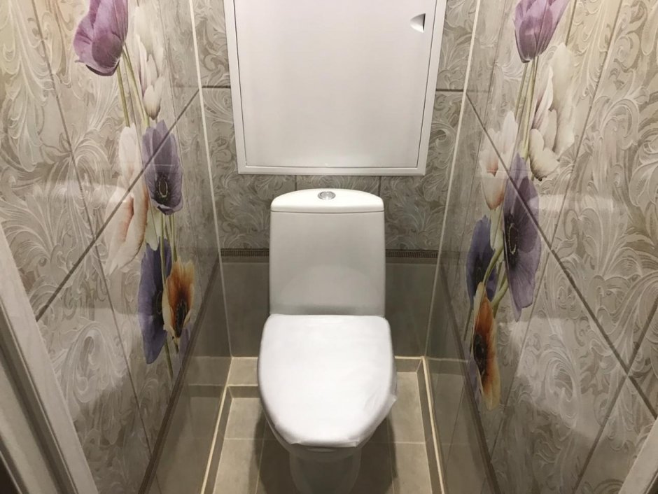 Туалет отделанный панелями
