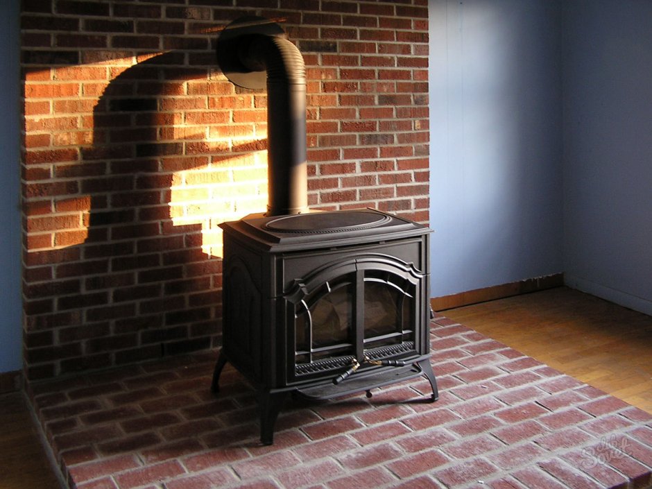 Jotul печь в кирпичной стене