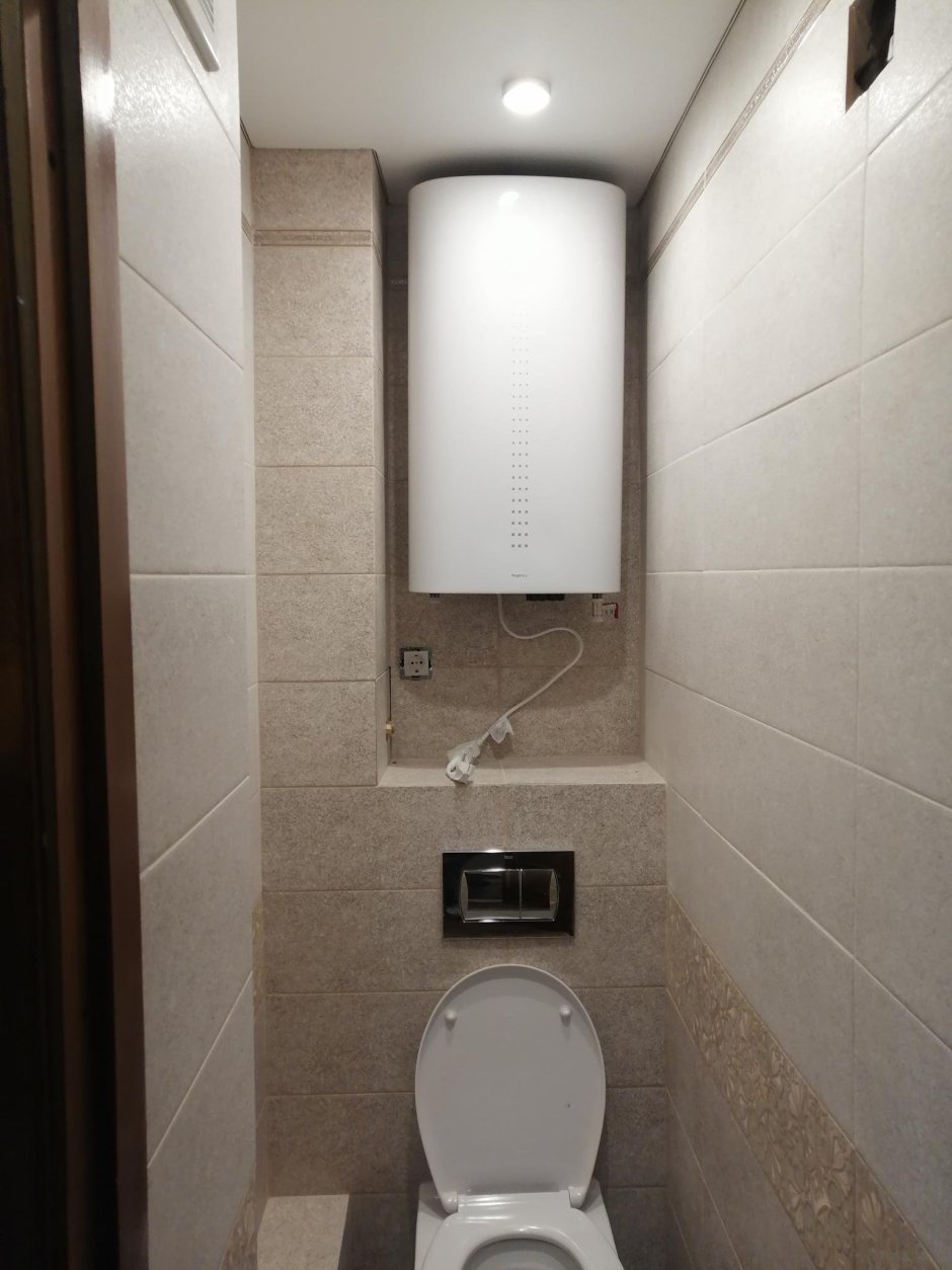 Дизайн туалета с инсталляцией и водонагревателем