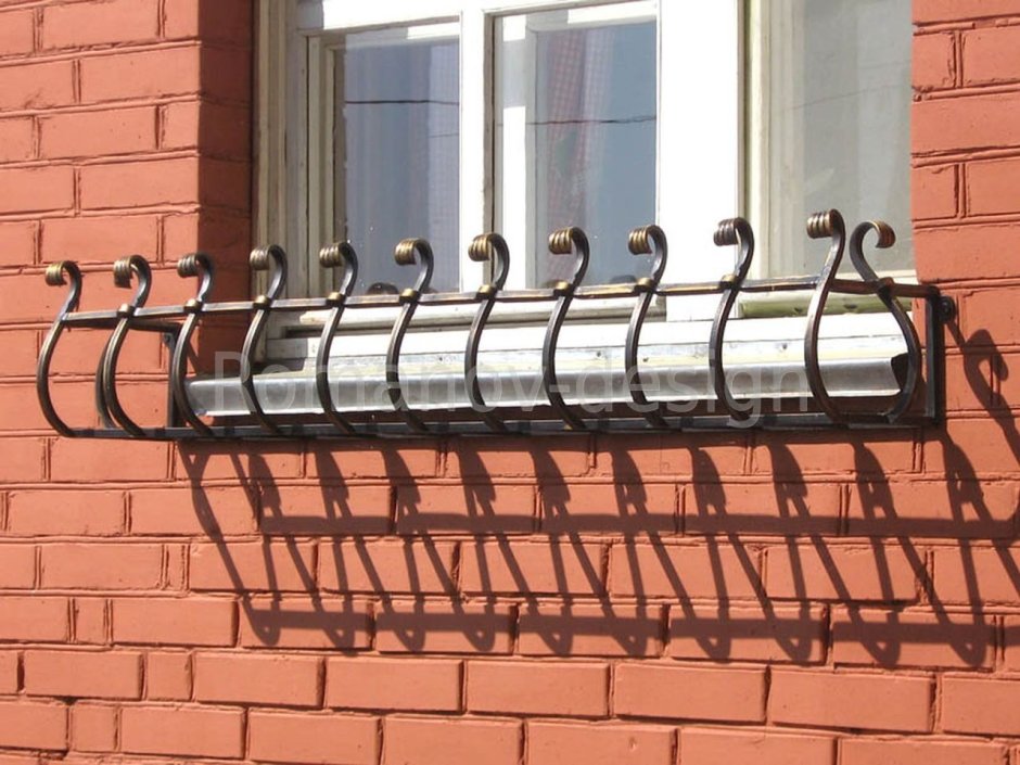Кованые цветочницы на балкон