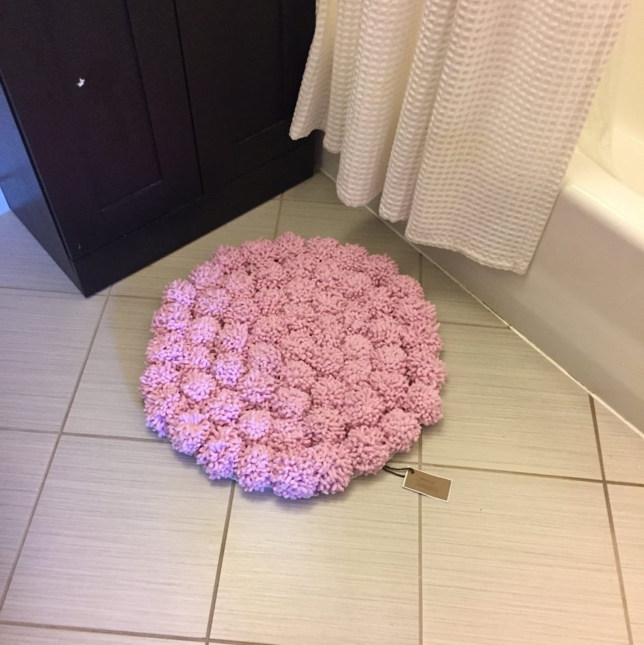 Коврик из бубонов