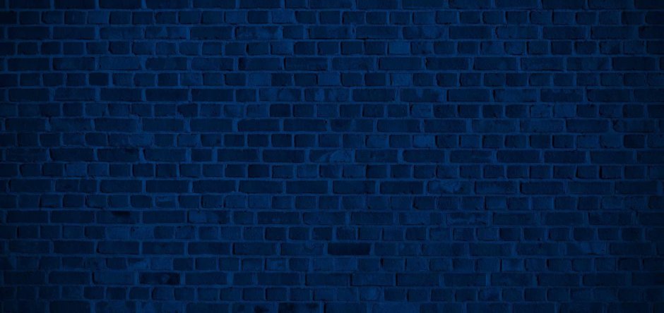 Темно синяя кирпичная стена