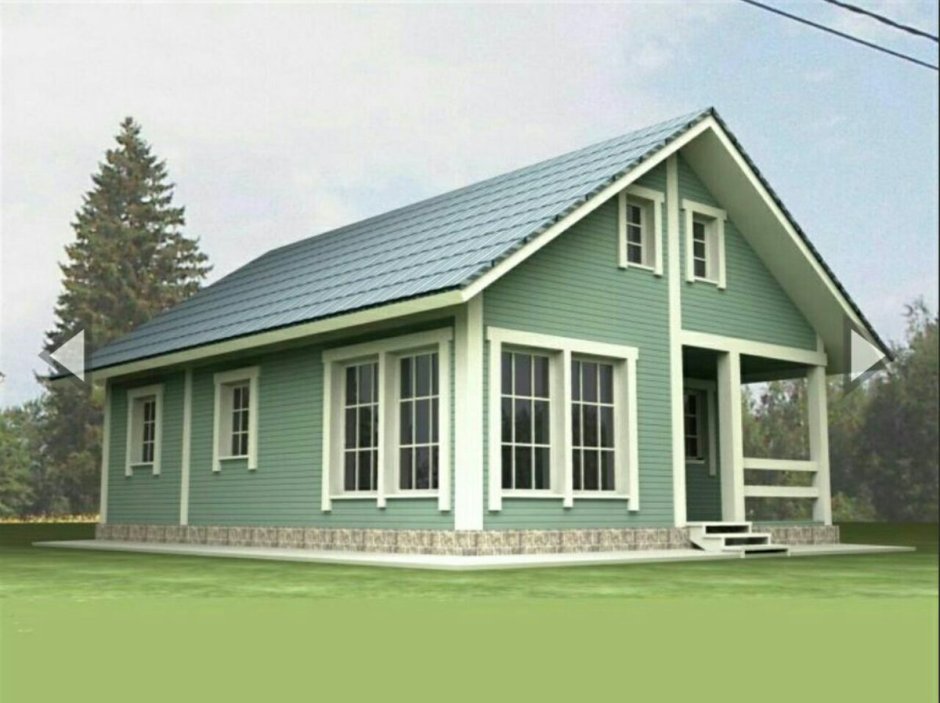 Каркасный дом с зеленой крышей