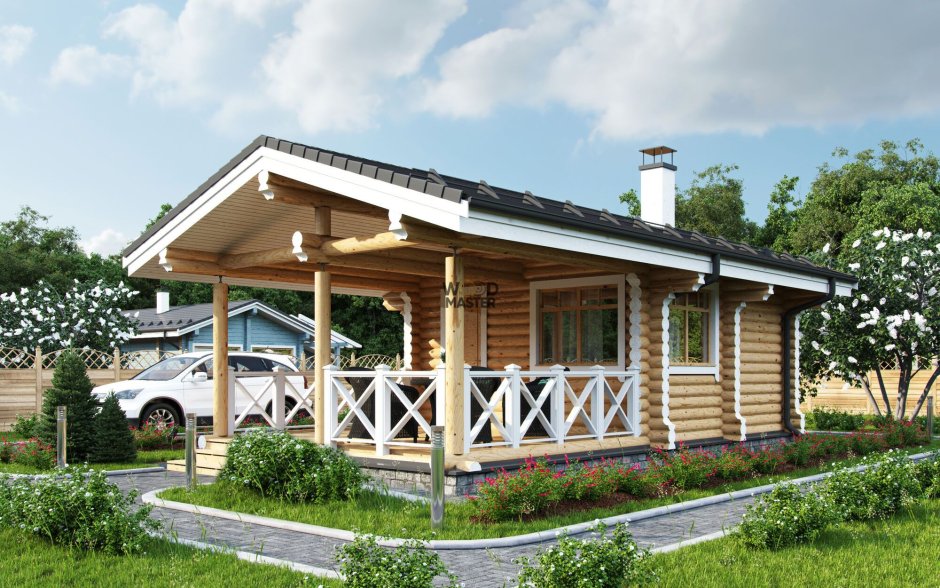 Красивая баня из бревна с террасой