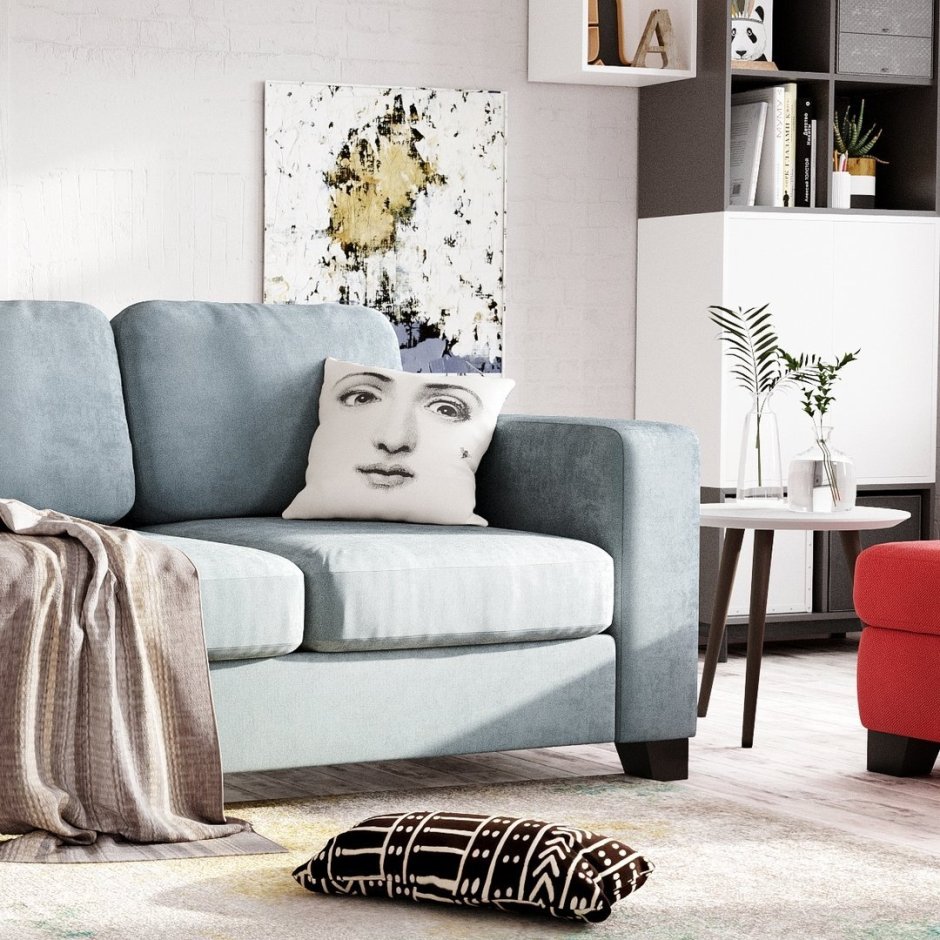 Серо-голубой диван в интерьере