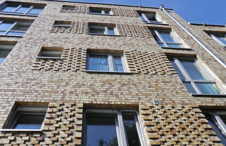 Фасады из клинкерной плитки на многоэтажных домах