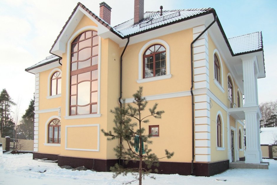 Фасад коттеджа штукатурка