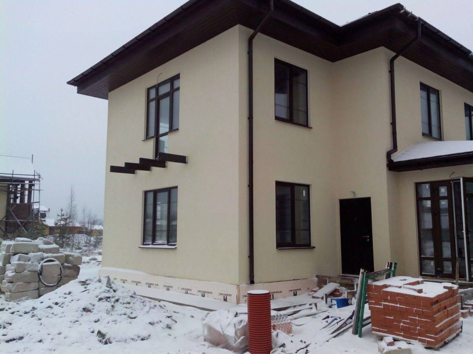 Отштукатуренный дом из газобетона