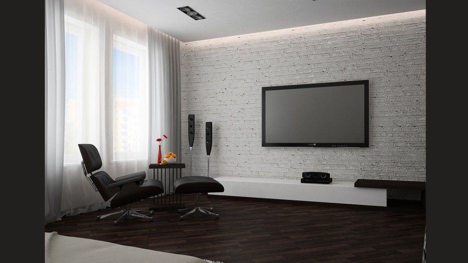 Телевизор на белой кирпичной стене в интерьере