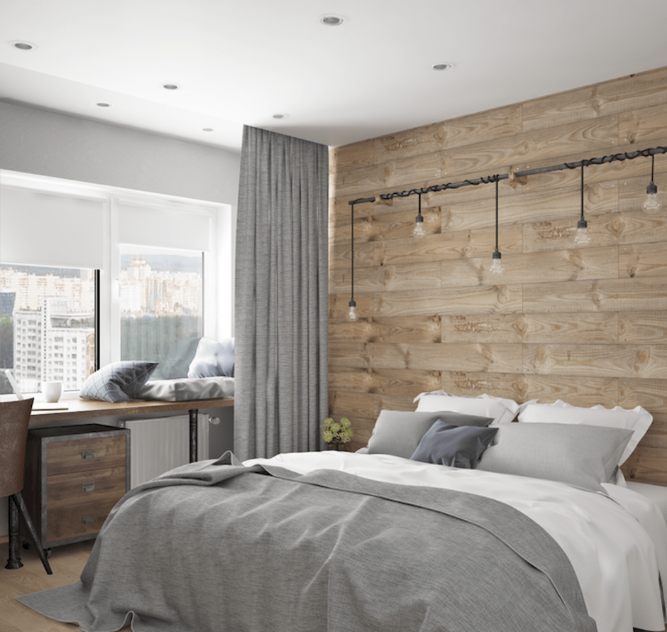 Спальня в скандинавском стиле с деревянной стеной