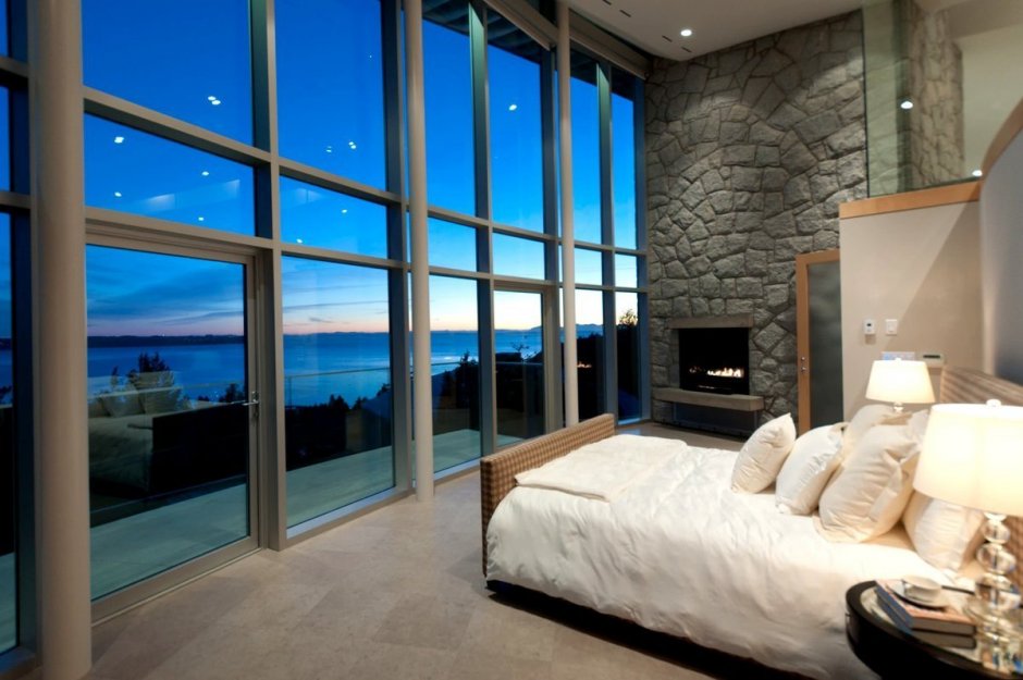 Интерьеры спален с панорамными окнами