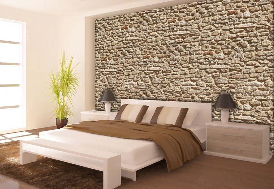 Декоративный камень в спальне на стене