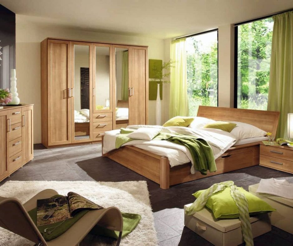 Серо зеленая спальня с мебелью цвета ольха