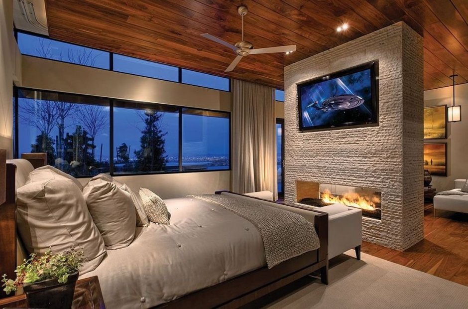 Современная спальня с камином