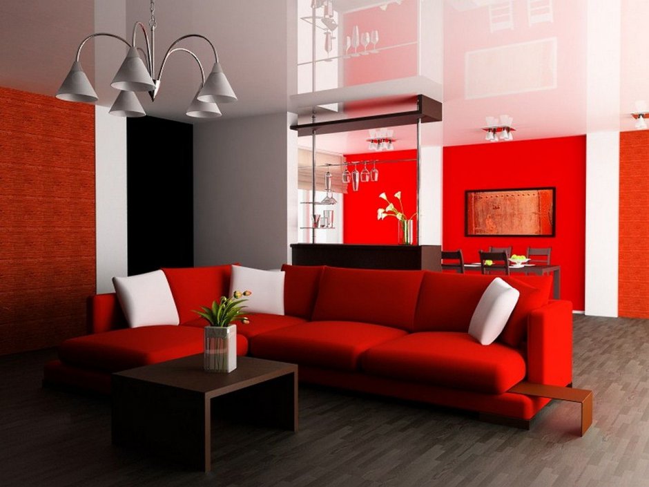 Простой интерьер гостиной с красным диваном