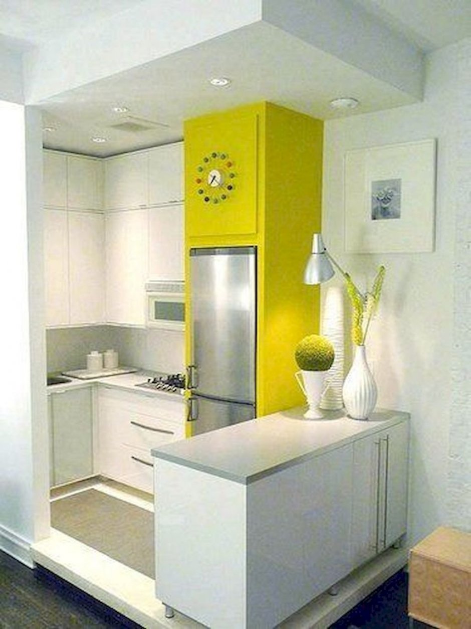 Дизайн малогабаритной квартиры в прихожей и кухне вместе со столовой