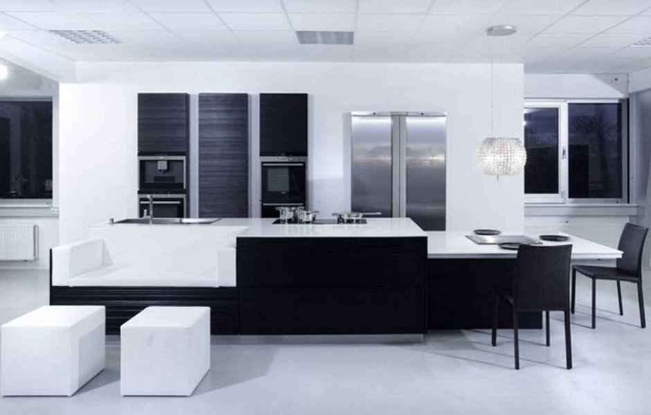 Островная черно белая кухня в стиле Модерн