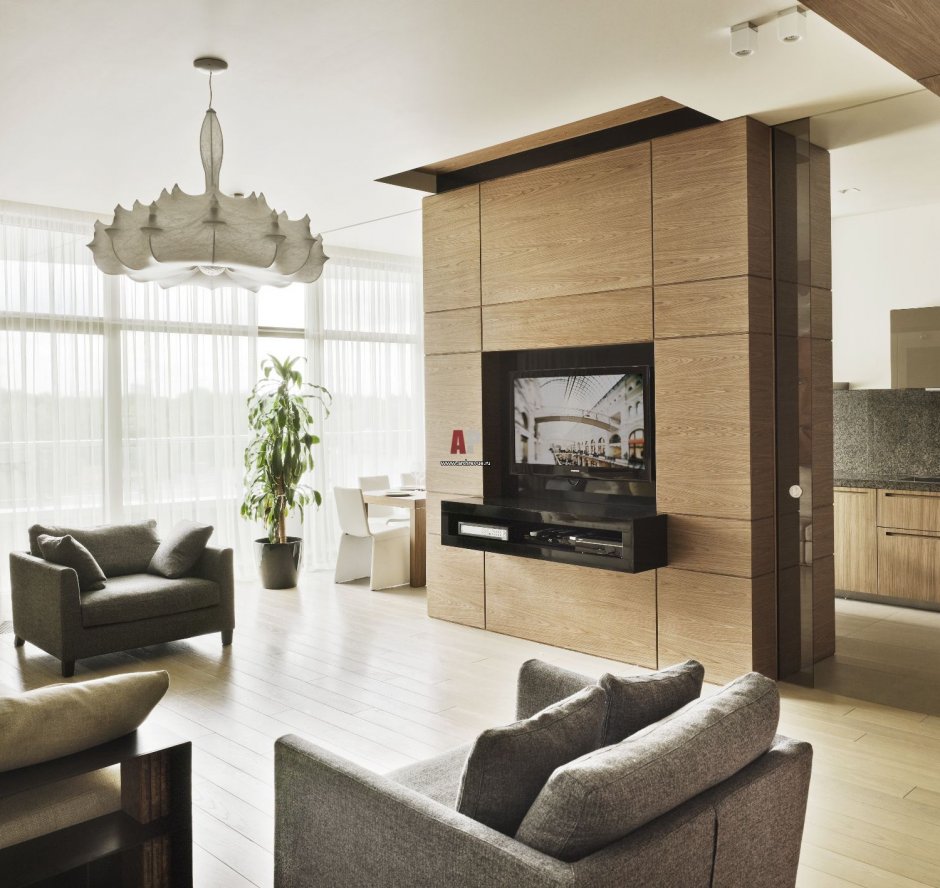 Телевизор между кухней и гостиной