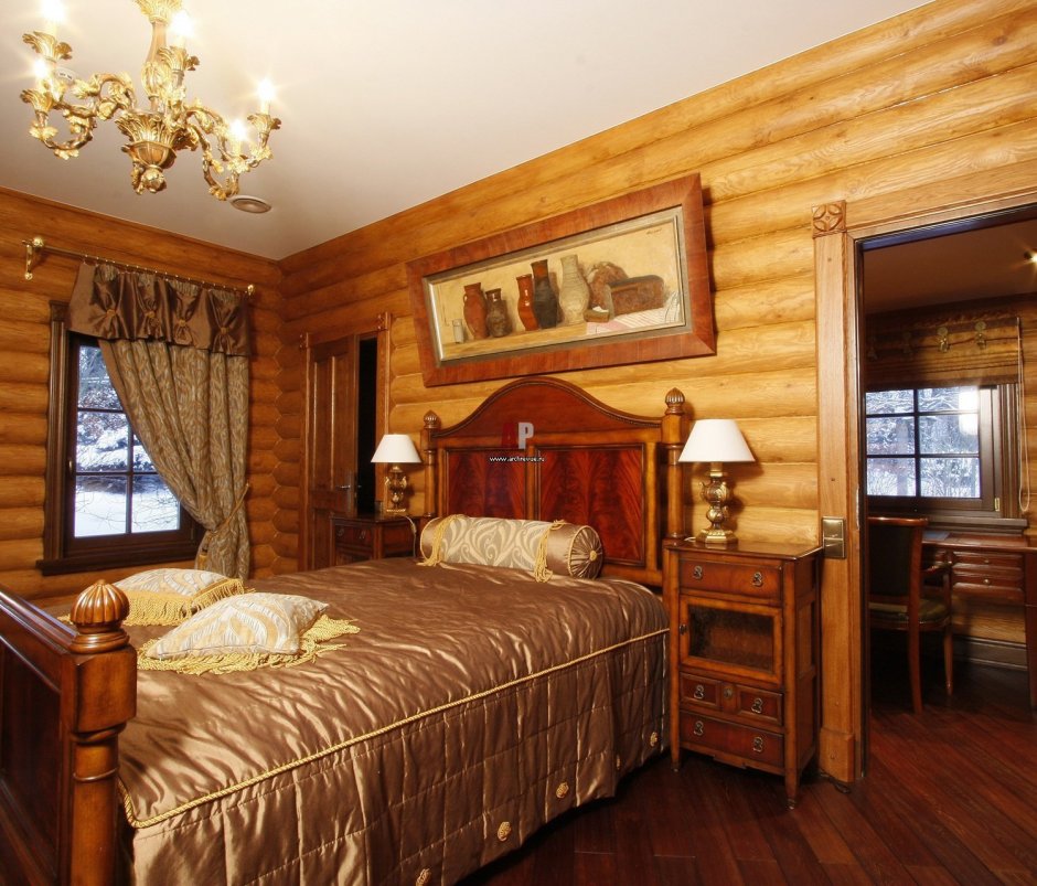 Спальня в доме из дерева