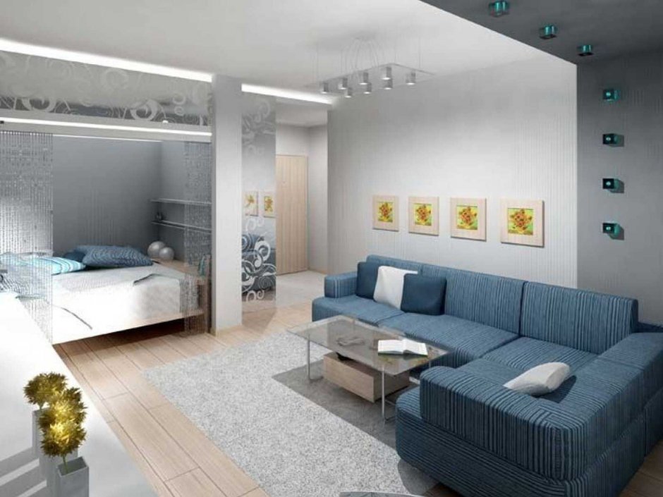 Интерьер комнаты с кроватью и диваном