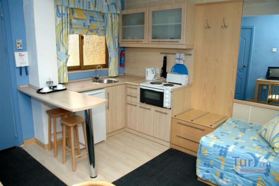 Интерьер комнаты в общежитии для семьи