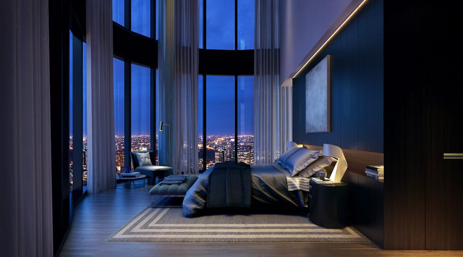Спальня с видом на город с панорамными окнами