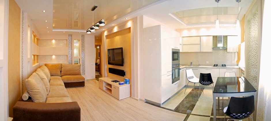 Интерьер комнаты в доме из кирпича 15 метров с тремя окнами