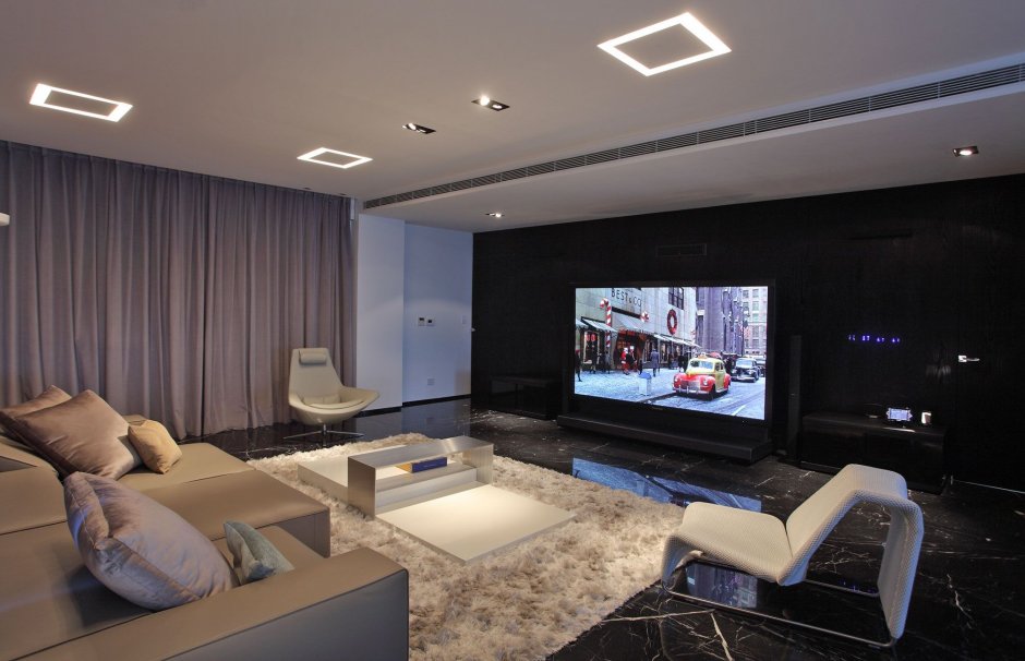 Современные зал с большим телевизором