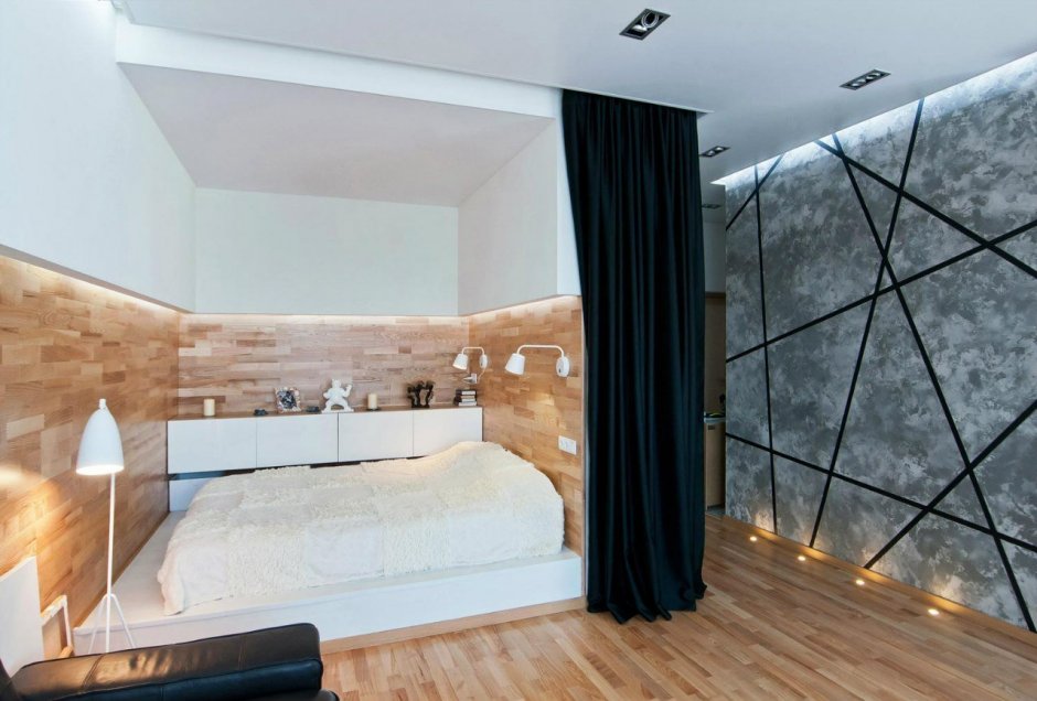 Спальня на подиуме в однокомнатной квартире