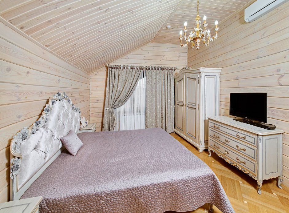 Отделка спальни в деревянном доме