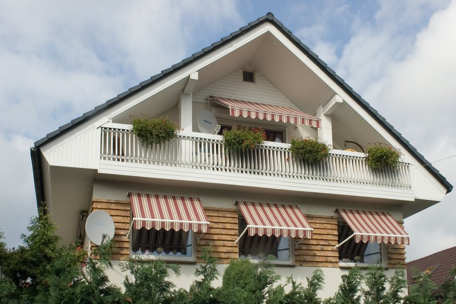 Мансардный дом с балконом