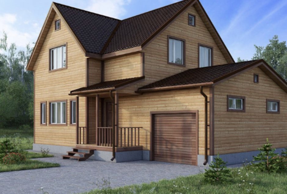 Деревянный дом с гаражом террасой и мансардой