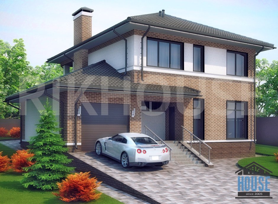 Проект двухэтажного кирпичного дома с встроенным гаражом