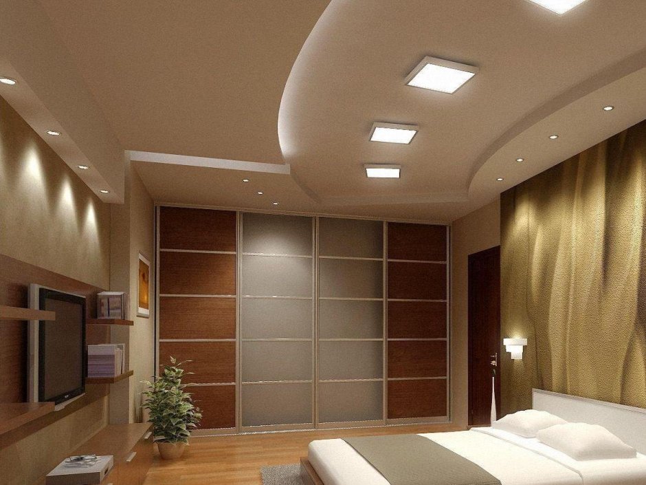 Многоуровневые натяжные потолки с подсветкой в спальне
