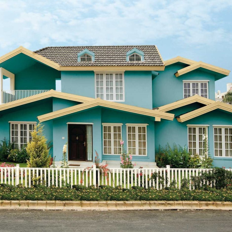 Фасад дома мятного цвета