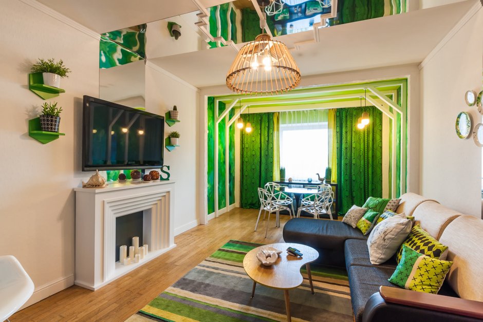 Зеленые стены в интерьере гостиной