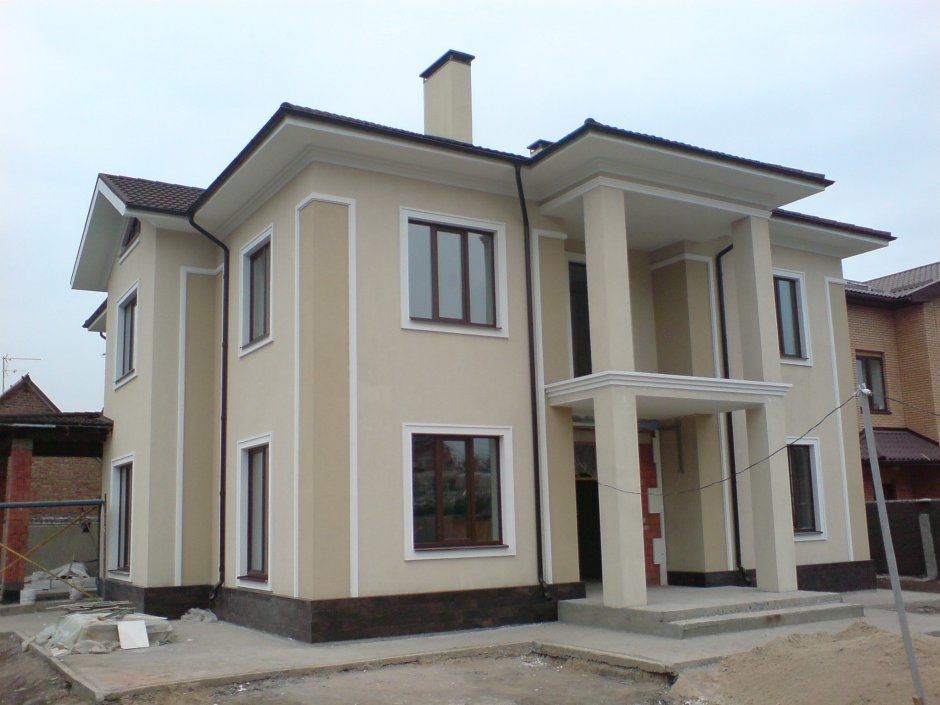 Фасады домов штукатурка