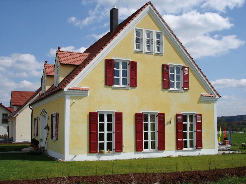 Дом с белыми ставнями в Германии