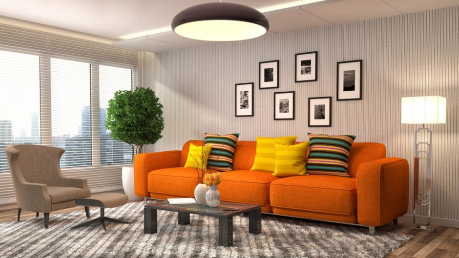 Интерьер зала с оранжевым диваном