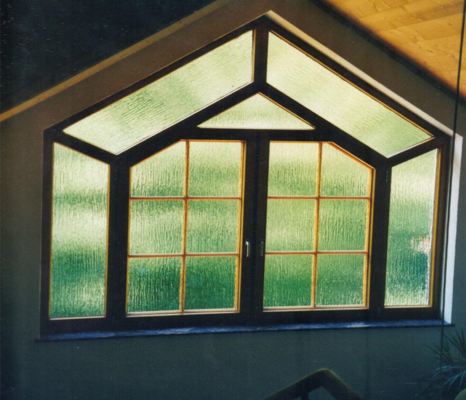 Трапециевидные окна в деревянном доме