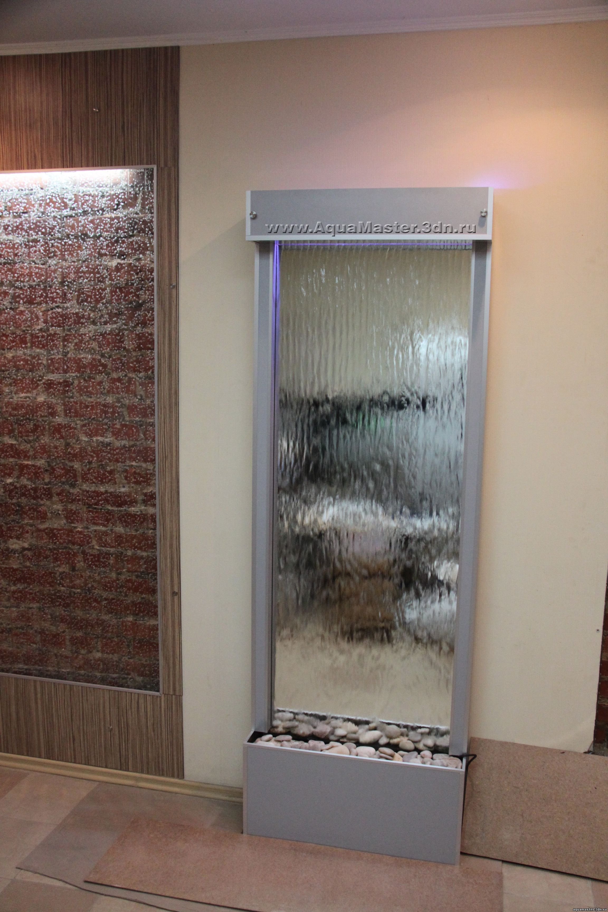 Водопад по другому. Настенный водопад для квартиры. Декоративный водопад по стеклу. Водопады по стеклу комнатные. Стеклянная стена водопад.