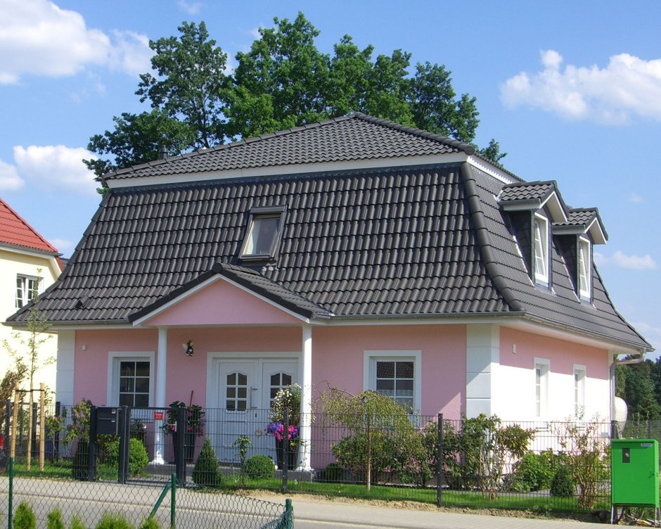Датская полувальмовая крыша